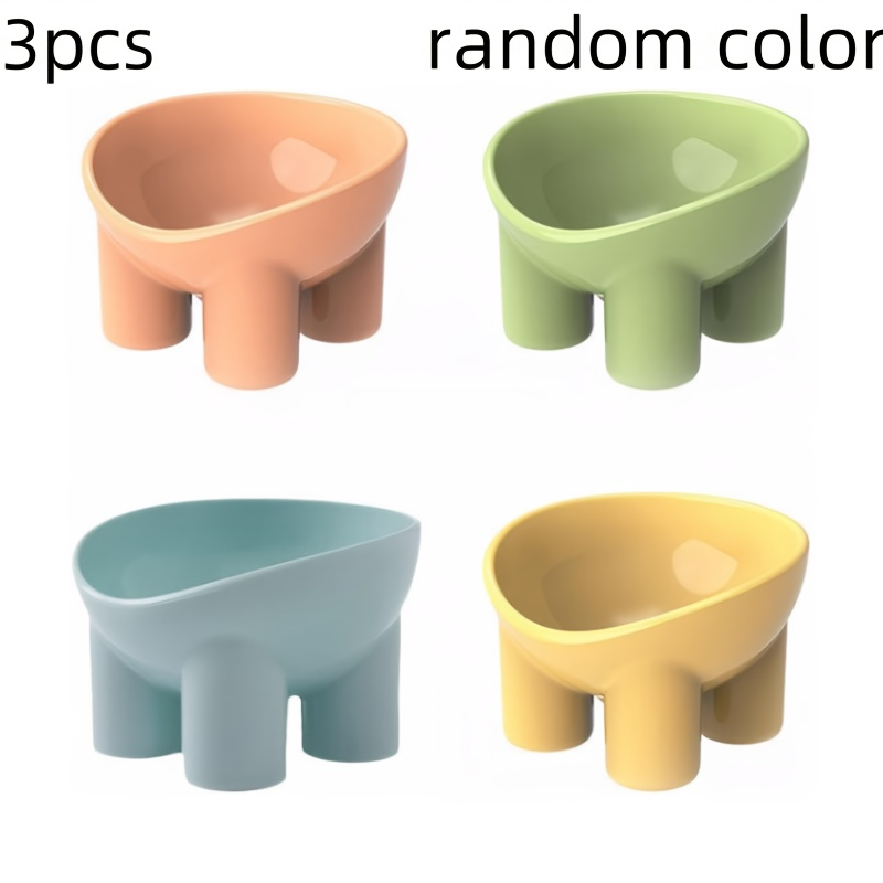 A set of 4, plastic, heightened, tilting heightened pet food and water bowls.