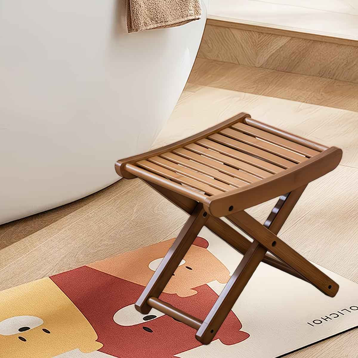 Foldable bamboo shower stool - suitable for showering and as a footrest.