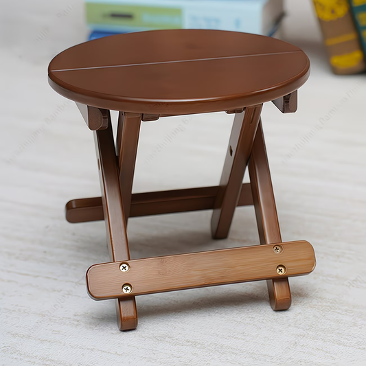 A portable folding round stool, suitable for travel, fishing, leisure, and bamboo use.