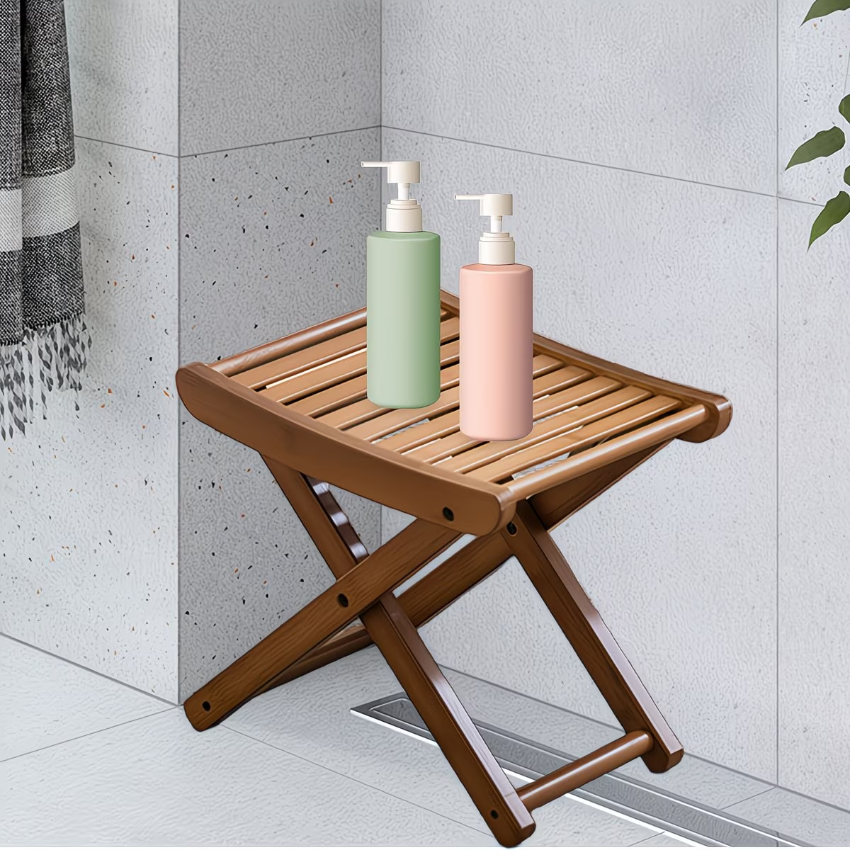 Foldable bamboo shower stool - suitable for showering and as a footrest.