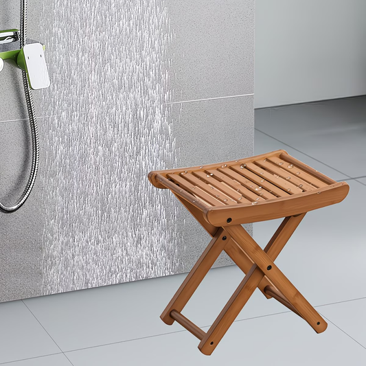 Foldable bamboo shower stool - suitable for showering and as a footrest.