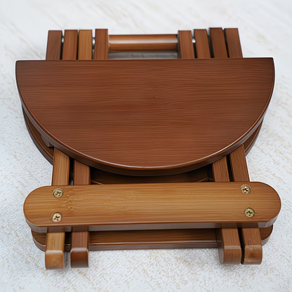 A portable folding round stool, suitable for travel, fishing, leisure, and bamboo use.