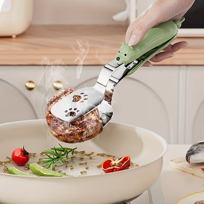 Portable stainless steel fish spatula, can be used as both a tong and a spatula.