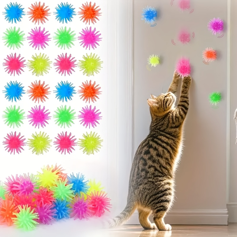 12-pack of interactive cat toy balls with suction cups, made of rubber, no batteries required.