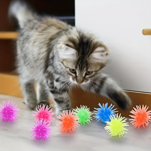 12-pack of interactive cat toy balls with suction cups, made of rubber, no batteries required.